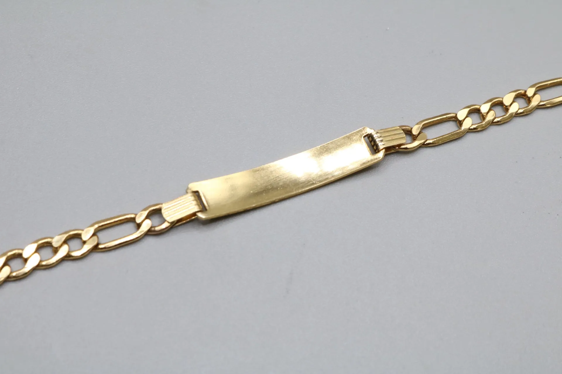 14k Yellow Gold ID Figaro Bracelet (Length 7 1/2")