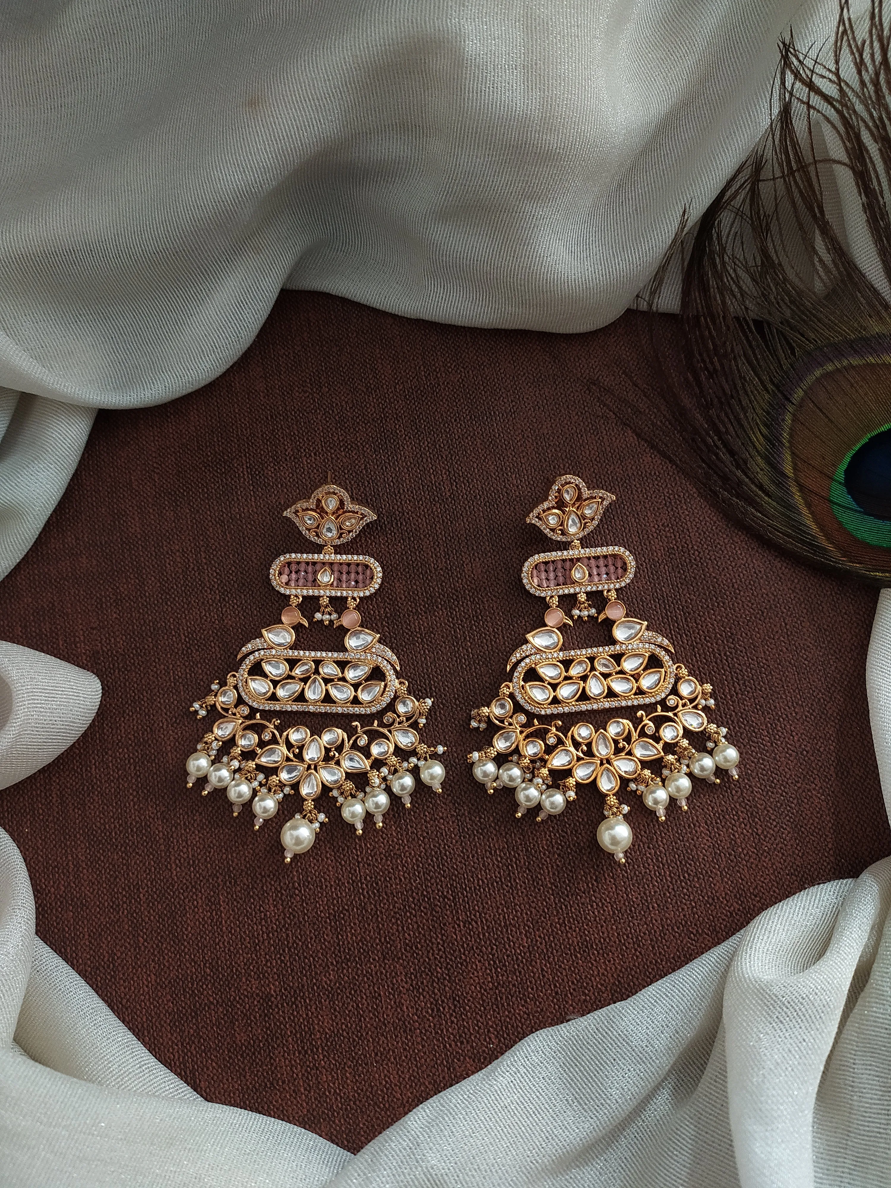 Elevate Your Look with Our Stunning Kundan Dangling Earrings